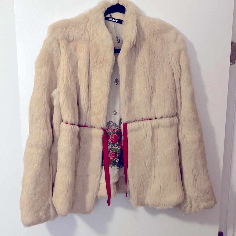 White Donna Karan/DKNY mid-length fur coat.
